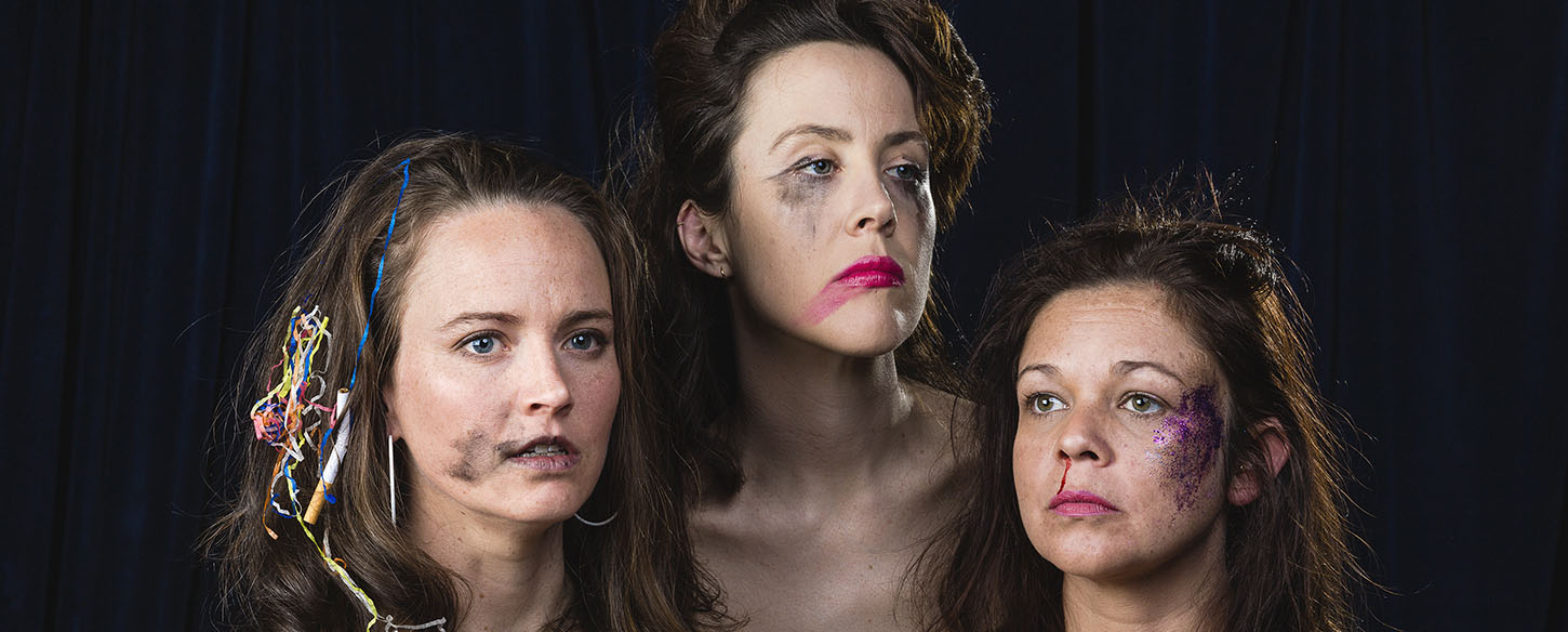 Headshots of three women with garish make up